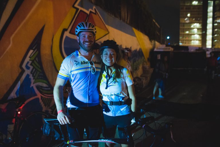Two riders stand at the starting line.